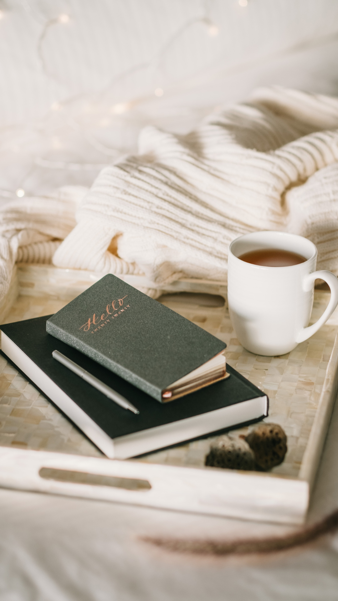 Notebooks and coffee on a table